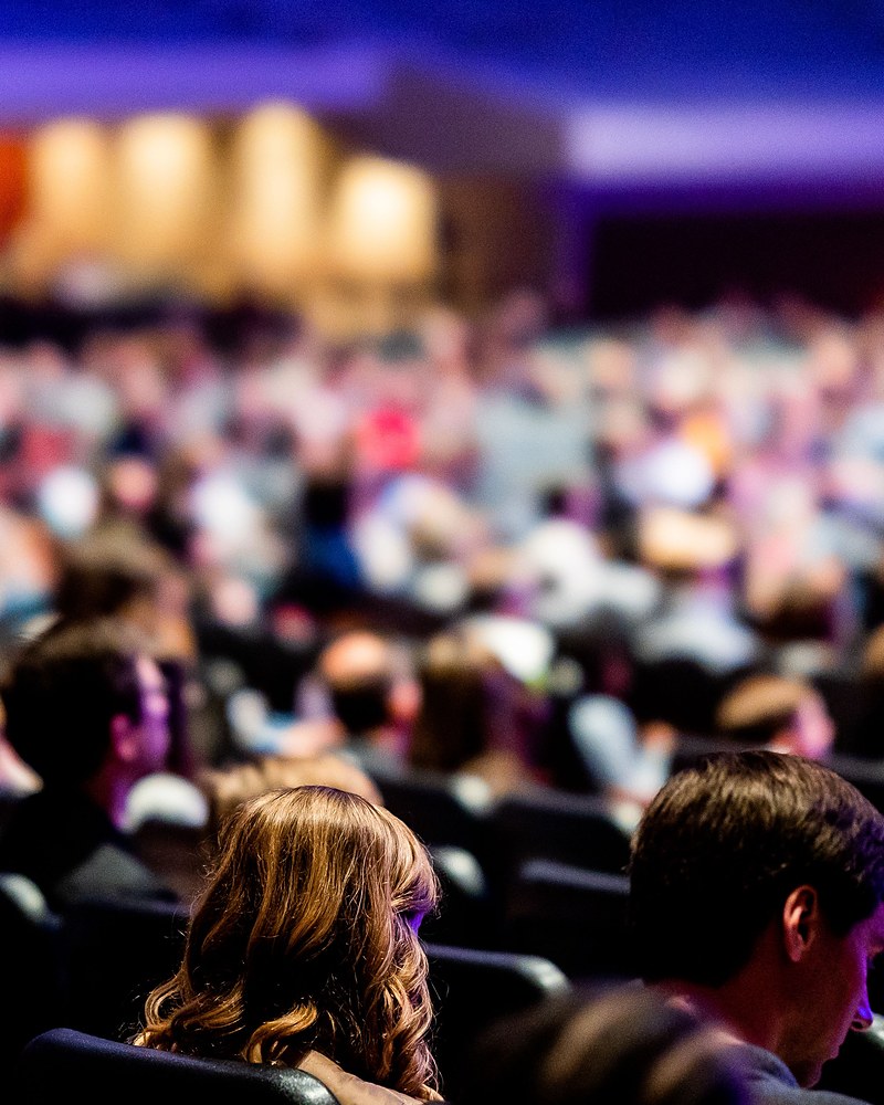 Conference audience in a large plenary hall